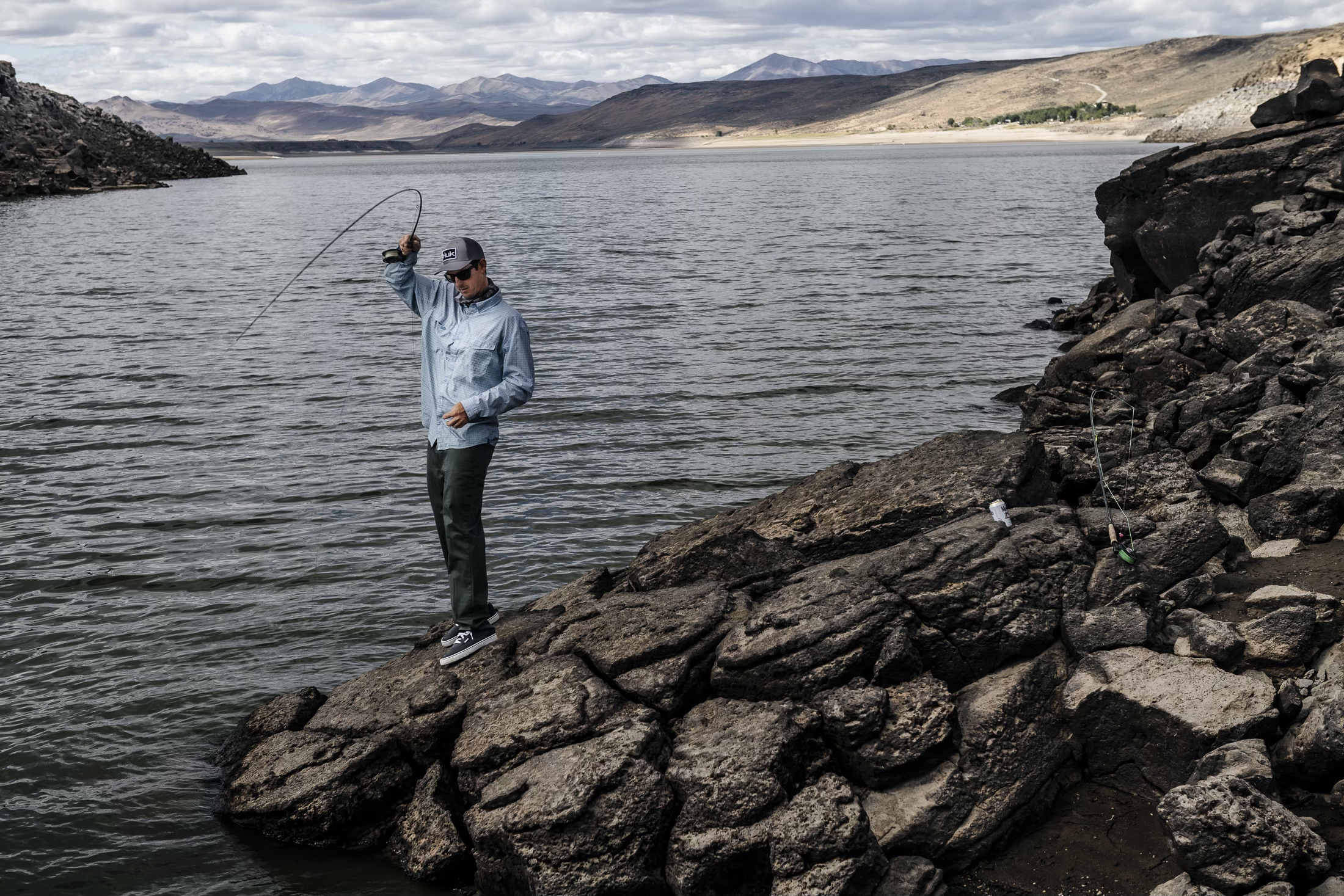 Angler fishing from the shore | Fly Fishing Idaho | Sun Valley Idaho Fly Fishing | Silver Creek Outfitters | Fly Fishing Guide Idaho