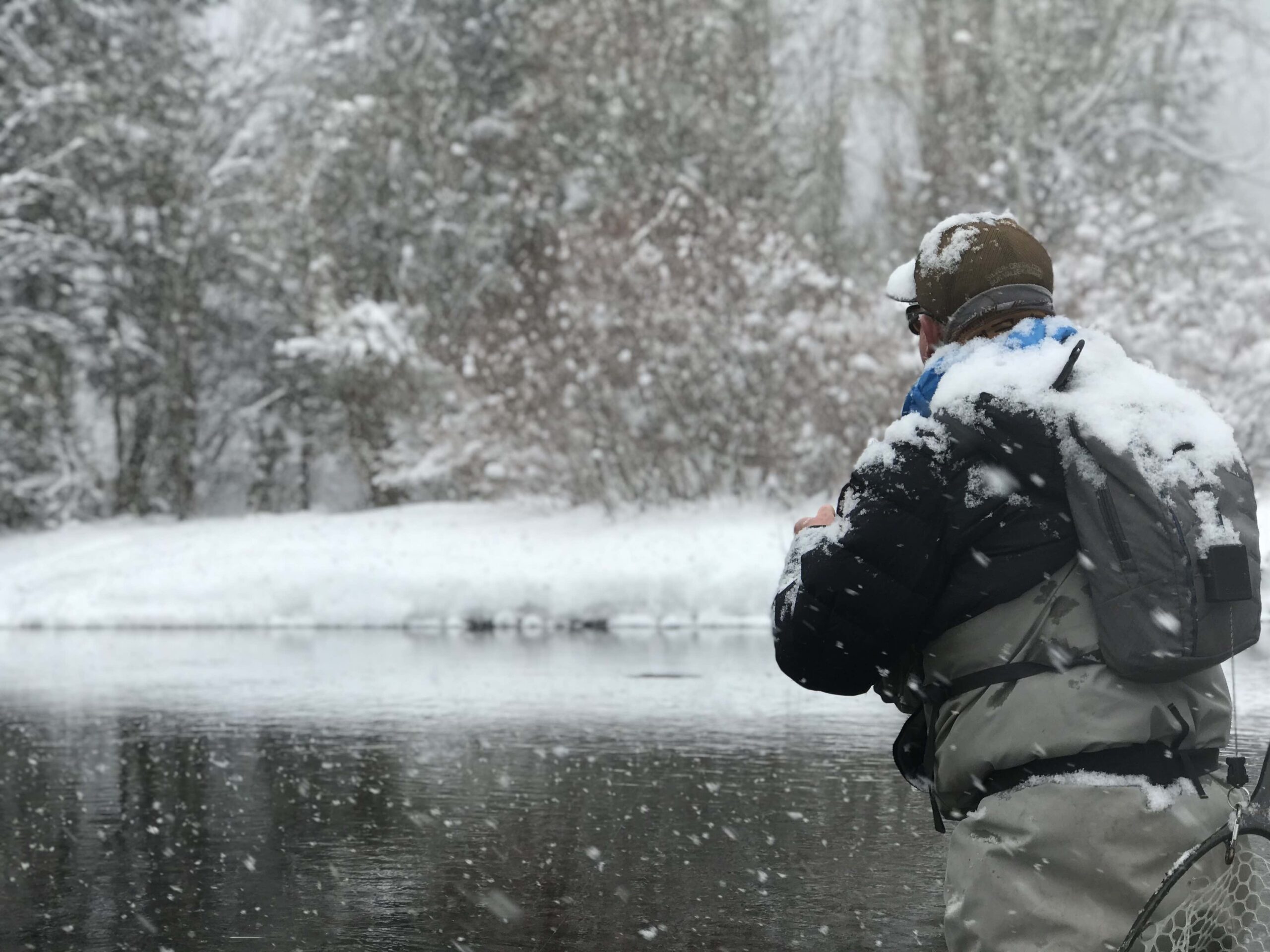 Angler Fishing in Winter | Sun Valley | Idaho | Silver Creek Outfitters