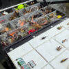 Fly Fishing Tackle box showing different flies.